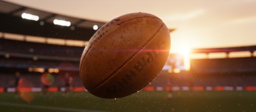 AFL football in flight over a stadium